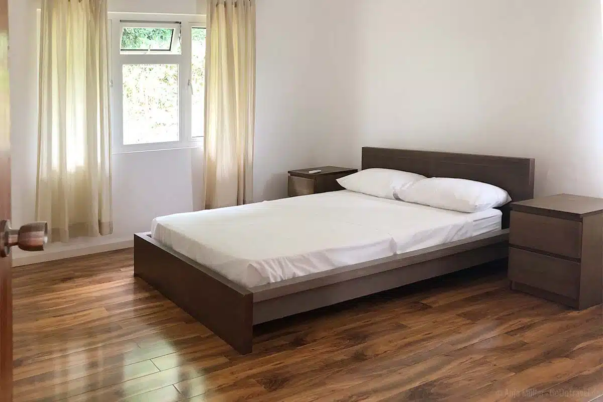 Ein Schlafzimmer in der Küche und Essbereich in der Songbird Villa Ein Schlafzimmer in der Küche und Essbereich in der Songbird Villa